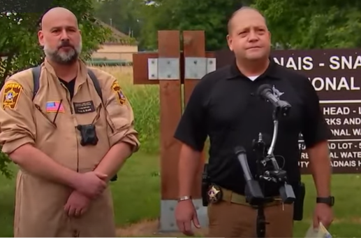 Ramsey County Sheriff’s Office Undersheriff Mike Martin  (at right) provides an update on Saturday, July 2, 2022, following the recovery of four bodies from Vadnais Lake, in a suspected murder-suicide.