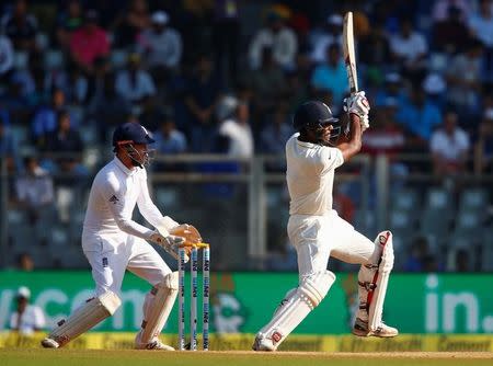 Cricket - India v England - Fourth Test cricket match - Wankhede Stadium, Mumbai, India - 11/12/16. India's Jayant Yadav celebrates his half century. REUTERS/Danish Siddiqui