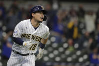 Milwaukee Brewers' Keston Hiura watches after hitting an RBI-double during the second inning of a baseball game against the Pittsburgh Pirates, Saturday, April 17, 2021, in Milwaukee. (AP Photo/Aaron Gash)