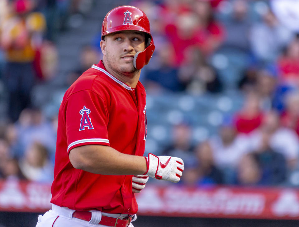ANAHEIM, CA - MARCH 24: Mike Trout of the Los Angeles Angels runs off the field after flying out in the first inning during a Freeway Series game against the Los Angeles Dodgers at Angel Stadium in Anaheim on Sunday, March 24, 2019. (Photo by Leonard Ortiz/MediaNews Group/Orange County Register via Getty Images)