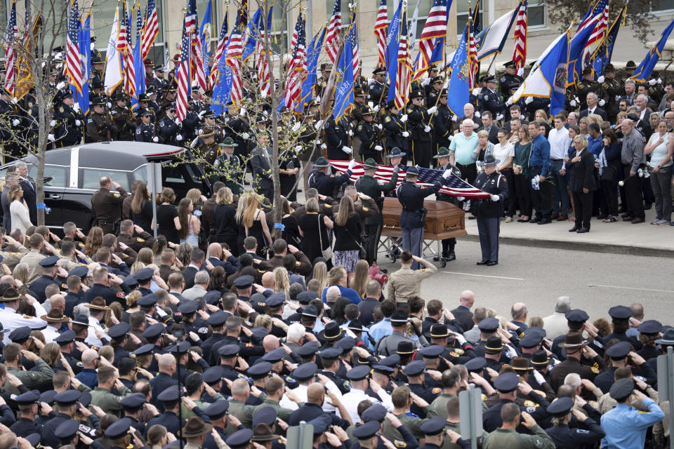 Over a thousand law enforcement officers from around the U.S. gathered for the funeral service for St. Croix County Sheriff’s Deputy Kaitlin “Kaitie” R. Leising, Friday, May 12, 2023 in Hudson, Wis.. Hundreds of law enforcement officers from several states joined other mourners in paying final respects Friday to a Wisconsin sheriff’s deputy who was fatally shot by a suspected drunken driver during a traffic stop. (Glen Stubbe/Star Tribune via AP)