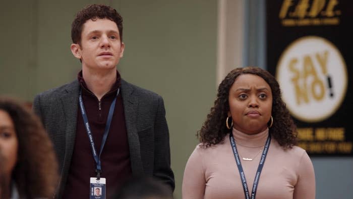 Quinta Brunson, and Chris Perfetti standing in auditorium on Abbott Elementary (episode 8, season 1)