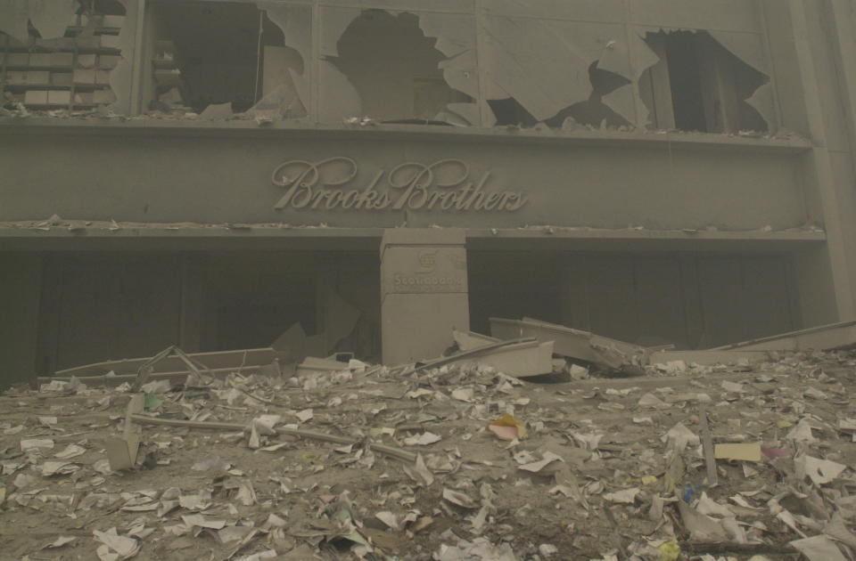 <p>A destroyed Brooks Brothers store near ground zero on Sept. 11, 2001, after terrorist attacks on the World Trade Center in New York City. (Photo: Mark Lennihan/AP) </p>