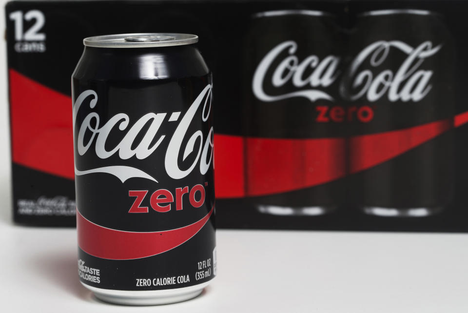 FILE- In this April 21, 2017, file photo, a can of Coca-Cola Zero Sugar is arranged for a photo in Surfside, Fla. Strong sales of water and sugar-free drinks powered third-quarter earnings for Coca-Cola Co reported Tuesday, Oct. 30, 2018. Coke said sales of Coca-Cola Zero Sugar saw double-digit percentage growth in North America. (AP Photo/Wilfredo Lee, File)