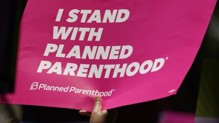 An abortion-rights supporter waves a Planned Parenthood poster during a rally in Smith Park in Jackson, Mississippi in June. Planned Parenthood, the nation’s leading reproductive health care provider and abortion rights advocacy organization, plans to spend a record $50 million ahead of November’s midterm elections, pouring money into contests where access to abortion will be on the ballot. (Photo: Rogelio V. Solis/AP)