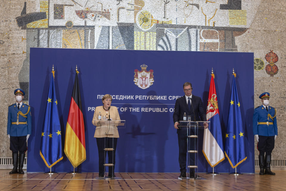 German Chancellor Angela Merkel, 2nd left, speaks during a joint press conference with Serbian president Aleksandar Vucic, 2nd right, in Belgrade, Serbia, Monday, Sept. 13, 2021. Merkel is on a farewell tour of the Western Balkans, as she announced in 2018 that she wouldn't seek a fifth term as Germany's Chancellor. (AP Photo/Marko Drobnjakovic)