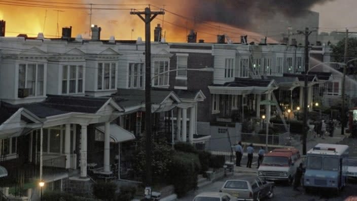 In this May 1985 file photo, scores of rowhouses burn in a fire in West Philadelphia, where police dropped a bomb on the militant group MOVE’s home in an attempt to arrest members, leading to the deaths of five children, six adults, and the burning of scores of homes in the neighborhood. (Photo: AP/File)