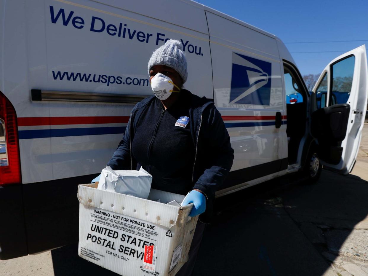 Nearly 500 post office workers have tested positive for the virus: AP