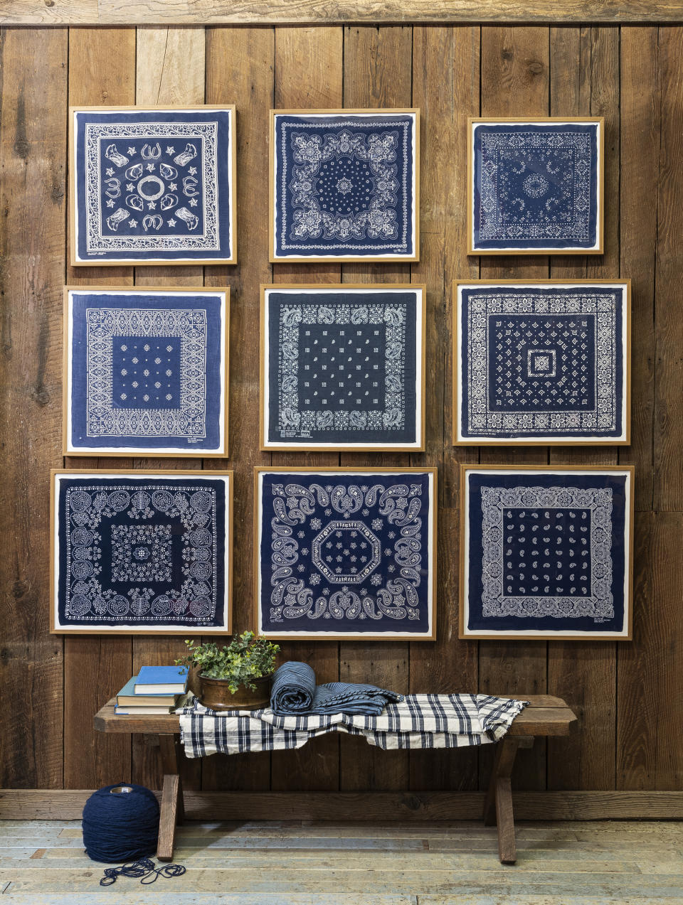 This image released by Portland Oregon-based interior designer Max Humphrey shows framed bandanas that serve as decorative wall art. (Christopher Dibble via AP)