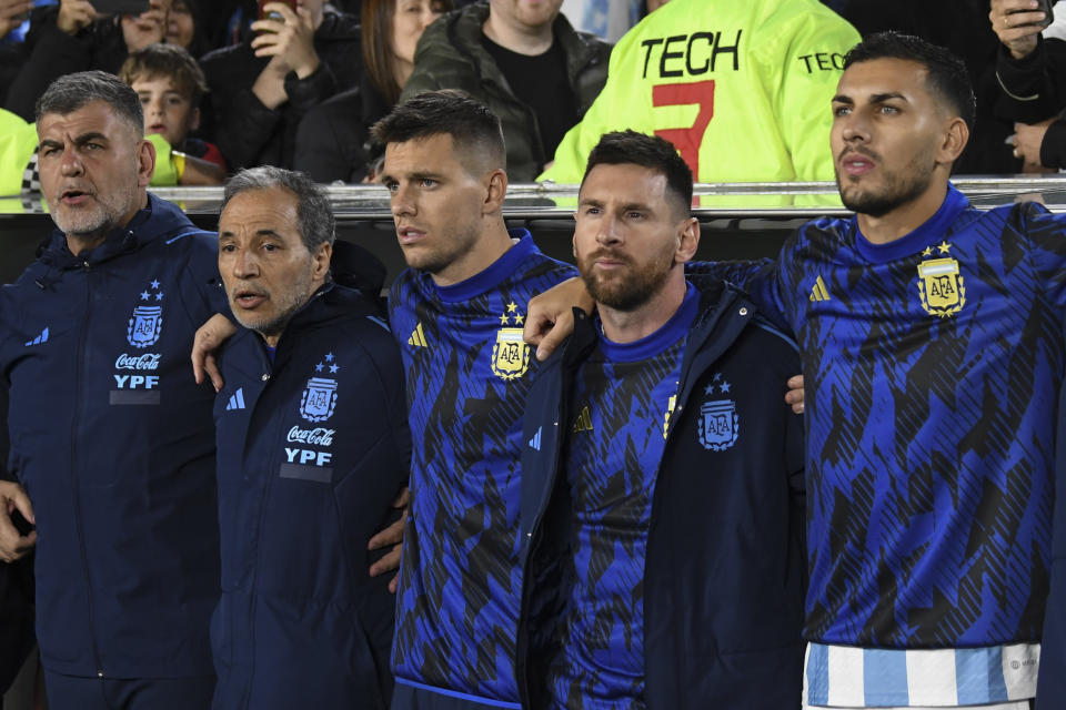 Argentina's Lionel Messi, second from right, embraces with teammates prior to a qualifying soccer match for the FIFA World Cup 2026 against Paraguay at the Monumental stadium in Buenos Aires, Argentina, Thursday, Oct. 12, 2023. (AP Photo/Gustavo Garello)