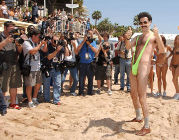 Borat ( Sacha Baron Cohen ) hits the beach at the Cannes Film Festival