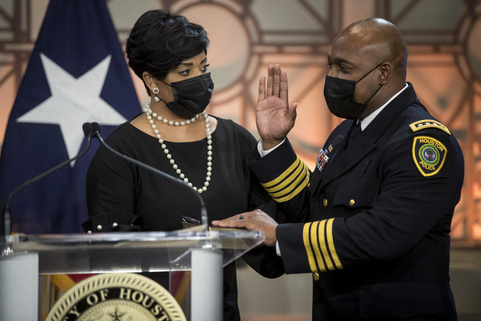 Houston Police Chief New Houston Police Chief Troy Finner, right, stands with his wife, Sherrian, as he is sworn in as HPD's newest chief during a ceremony at City Hall Monday, April 5, 2021, in Houston. Finner is a 54-year-old veteran who hails from Fifth Ward and attended Madison High School in Houston. He formally takes the reins of the police department, the same day that outgoing Chief Art Acevedo is sworn in as chief in Miami. (Brett Coomer/Houston Chronicle via AP)