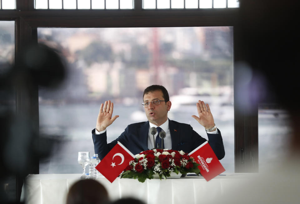 Ekrem Imamoglu, the new Mayor of Istanbul from Turkey's main opposition opposition Republican People's Party (CHP) talks to members of foreign media a day after he took over office, in Istanbul, Friday, June 28, 2019. Imamoglu said Friday he was prepared against any attempts by the government to restrict his powers while emphasizing his willingness to work with Turkish President Recep Tayyip Erdogan.(AP Photo/Lefteris Pitarakis)