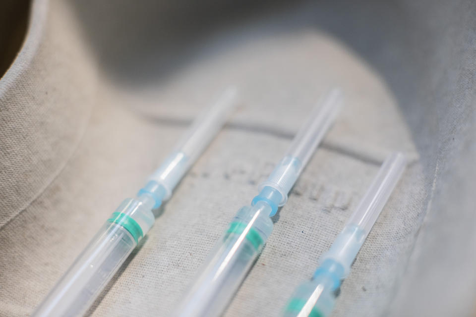 Syringes with Pfizer-BioNTech COVID-19 vaccines are ready to be used at the Nurse Isabel Zendal Hospital in Madrid, Spain, Monday, Feb. 1, 2021. (AP Photo/Bernat Armangue)