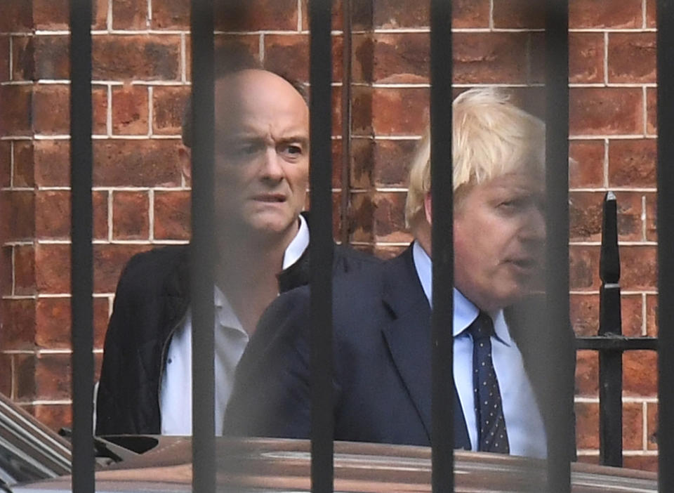 File photo dated 03/09/19 of Prime Minister Boris Johnson with his then senior aide Dominic Cummings leaving Downing Stret, London. Boris Johnson will publicly announce his resignation later today, likely before lunchtime, the BBC is reporting. Issue date: Thursday July 7, 2022.