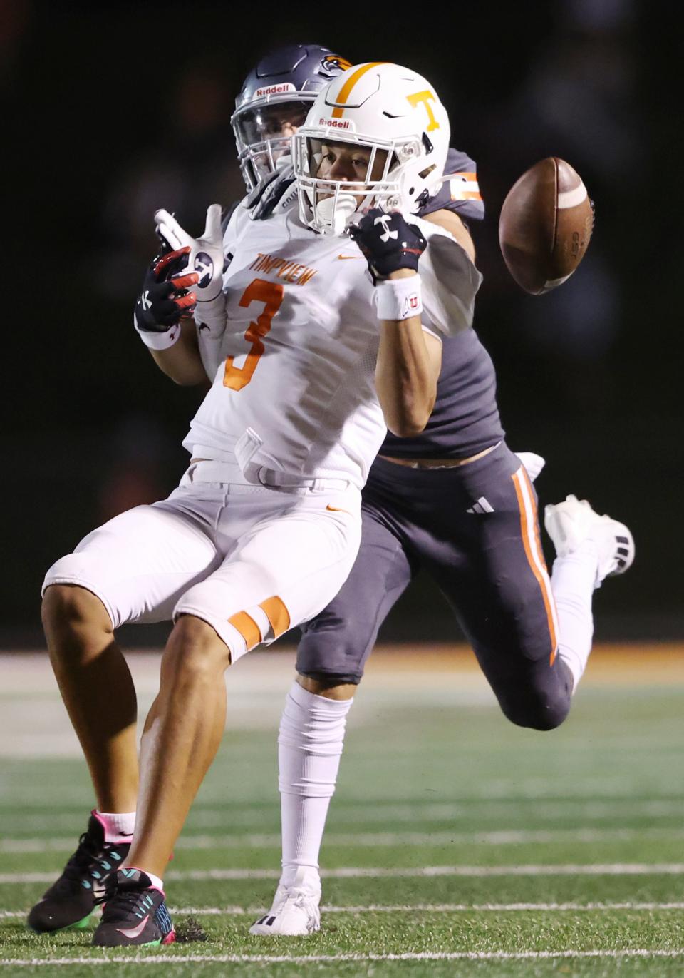 Timpview’s Kennan Pula is hit early by Skyridge’s Tavian Exwards for a pass interference call in Lehi on Friday, Aug. 11, 2023. Skyridge won 26-14. | Scott G Winterton, Deseret News