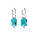 <p><a class="link " href="https://go.redirectingat.com?id=127X1599956&url=https%3A%2F%2Fwww.annoushka.com%2Fuk%2F18ct-white-gold-turquoise-tulip-earrings-B029767.html&sref=https%3A%2F%2Fwww.harpersbazaar.com%2Fuk%2Ffashion%2Fjewellery-watches%2Fg34843722%2Fdecember-birthstone-jewellery%2F" rel="nofollow noopener" target="_blank" data-ylk="slk:SHOP NOW;elm:context_link;itc:0;sec:content-canvas">SHOP NOW</a></p><p>Inspired by the shape of pretty spring tulips, each of these turquoise blooms holds a gleaming white pearl pistil within its petals. </p><p>White gold, diamond and turquoise earrings, £1,136, <a href="https://go.redirectingat.com?id=127X1599956&url=https%3A%2F%2Fwww.annoushka.com%2Fuk%2F18ct-white-gold-turquoise-tulip-earrings-B029767.html&sref=https%3A%2F%2Fwww.harpersbazaar.com%2Fuk%2Ffashion%2Fjewellery-watches%2Fg34843722%2Fdecember-birthstone-jewellery%2F" rel="nofollow noopener" target="_blank" data-ylk="slk:Annoushka;elm:context_link;itc:0;sec:content-canvas" class="link ">Annoushka</a></p>