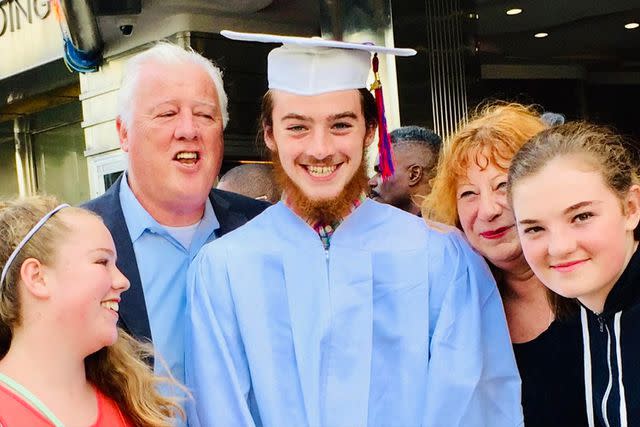 <p>Courtesy of Cloud Family</p> Angus Cloud, twin sisters Fiona and Molly, mother Lisa Cloud and father Conor Hickey at high school graduation. COURTESY OF CLOUD FAMILY