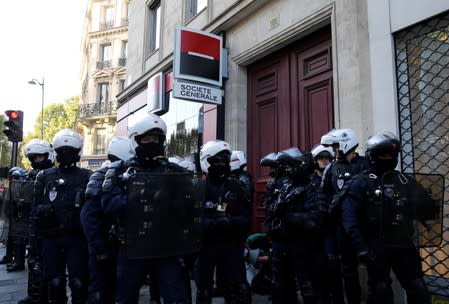 Protesters attend a demonstration on Act 45 (the 45th consecutive national protest on Saturday) of the yellow vests movement in Paris