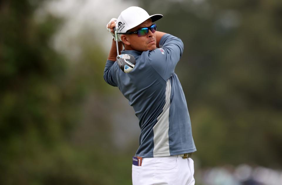 Rickie Fowler hits a tee shot on the 8th hole during the first round of the U.S. Open at Los Angeles Country Club.