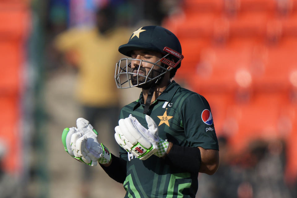Pakistan's Mohammad Rizwan prays as he celebrates his fifty runs during the ICC Men's Cricket World Cup match between Pakistan and Netherlands in Hyderabad, India, Friday, Oct. 6, 2023. (AP Photo/Mahesh Kumar A.)