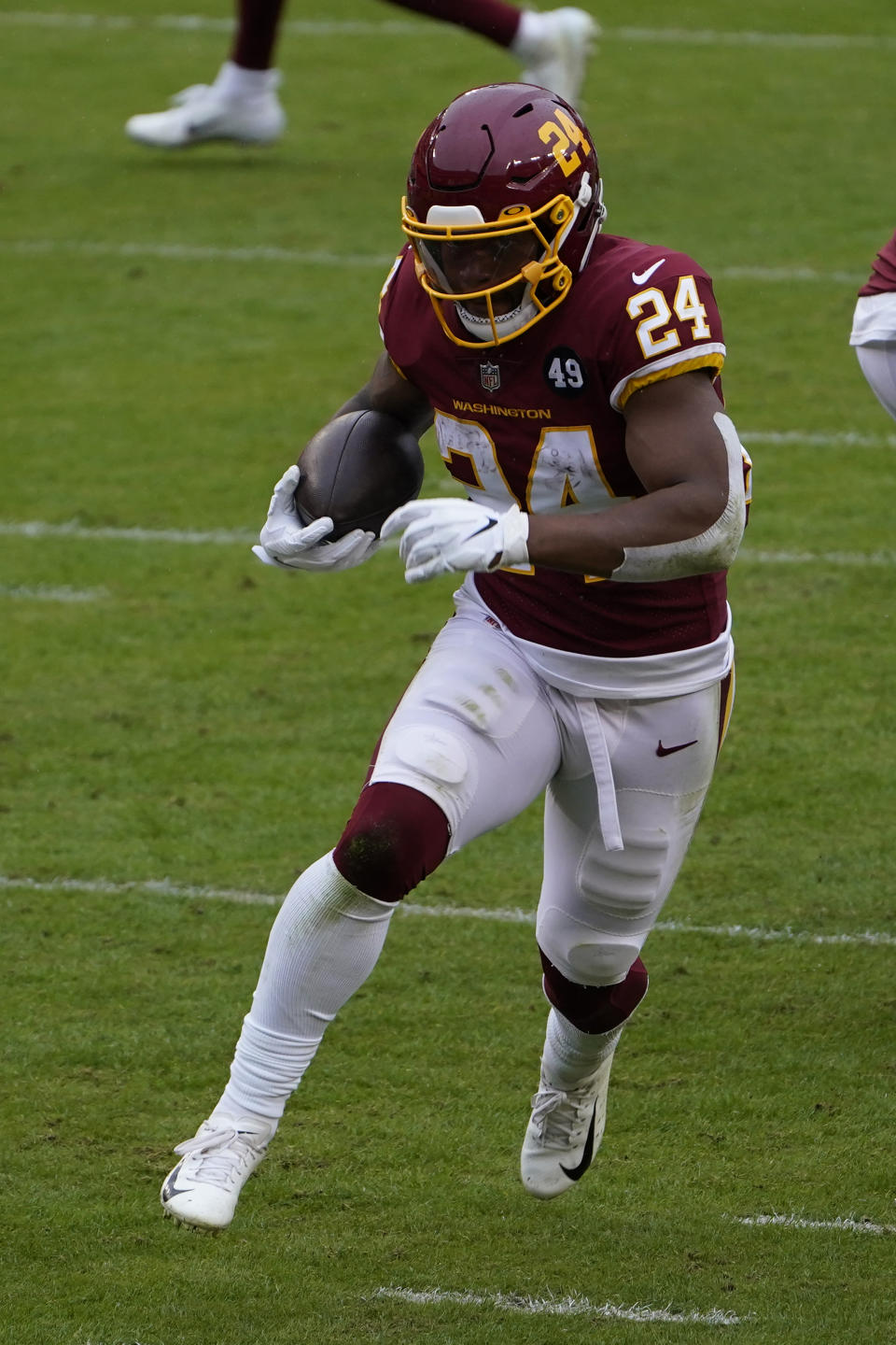 Washington Football Team running back Antonio Gibson (24) running downfield during the first half of an NFL football game against Dallas Cowboys, Sunday, Oct. 25, 2020, in Landover, Md. (AP Photo/Susan Walsh)