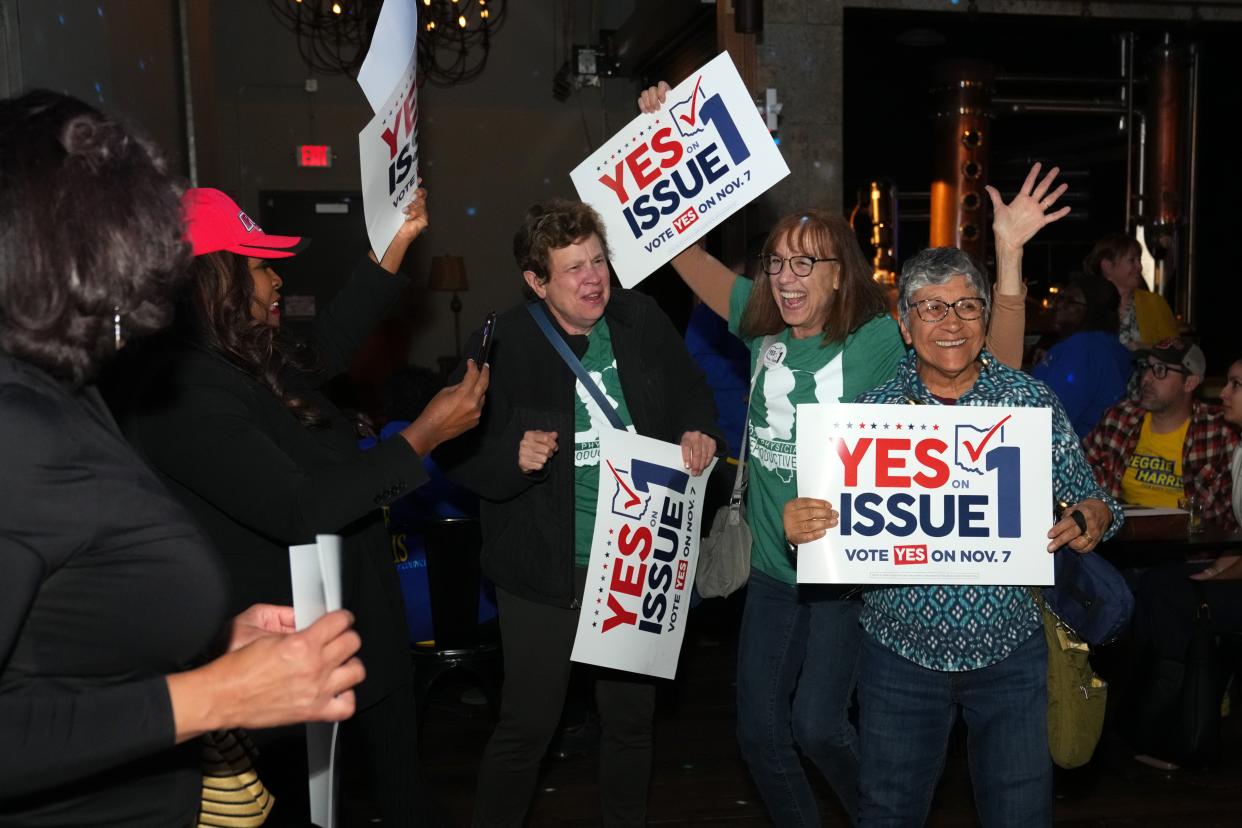 Voters react to the passage of Ohio Issue 1, a ballot measure to amend the state constitution and establish a right to abortion at an election night party hosted by the Hamilton County Democratic Party, Tuesday, Nov. 7, 2023, at Knox Joseph Distillery in the Over-the-Rhine neighborhood of Cincinnati.