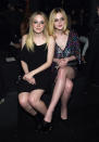 <p>The Fanning sisters, Dakota and Elle, sat front row (of course) with heavy glitter eye makeup, especially on the bottom of the eyes for Elle. <i>(Photo: Getty Images)</i><br></p>