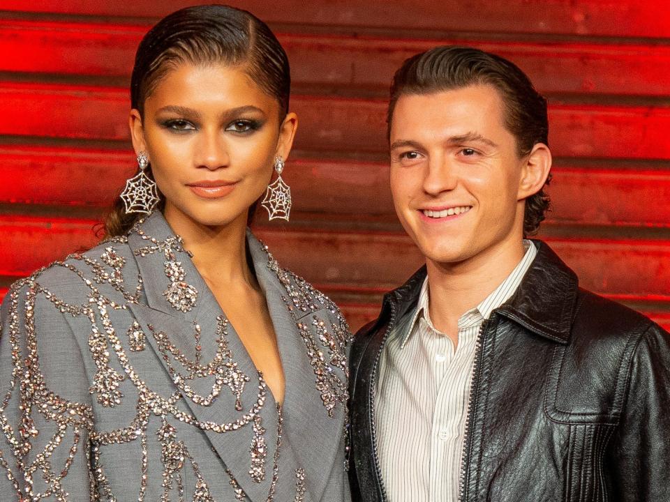 Zendaya and Tom Holland posing in December 2021.