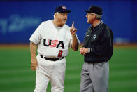 Team manager Tommy Lasorda of the USA talks to an official during the semifinal match against the USA at the Baseball Stadium in Olympic Park during the Sydney Olympic Games in Sydney, Australia on September 26, 2000. The USA defeated Korea 3-2 on a game winning home run at the bottom of the ninth, advancing them to the gold medal game. (Photo by Jamie Squire /Getty Images)