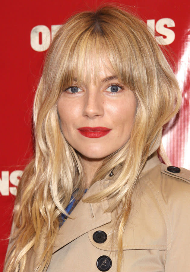 Celebrities wearing red lipstick: <a href="http://uk.lifestyle.yahoo.com/beauty-how-to-sienna-miller-no-make-up-beauty-look--090125365.html" data-ylk="slk:Sienna Miller;elm:context_link;itc:0;sec:content-canvas;outcm:mb_qualified_link;_E:mb_qualified_link;ct:story;" class="link  yahoo-link">Sienna Miller</a> wore a matte red lipstick on the Orphans red-carpet.<br><br>[WENN]