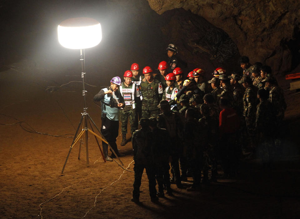 Thai Military medical personnel plan a rescue operation at the Tham Luang cave in Tham Luang Khun Nam Nang Noon Forest Park. Source: AAP