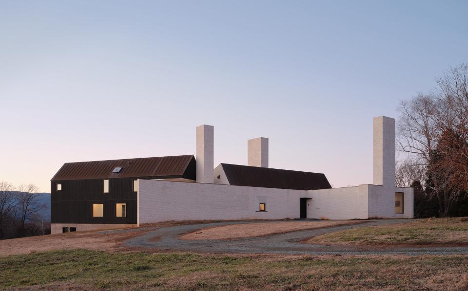 This Modern Home in an Idyllic Setting Is Defined by Three Bold Chimneys