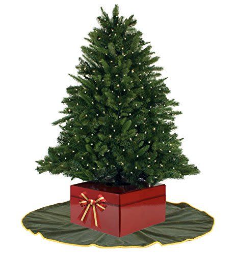 <p><strong>Christmas Tree Box</strong></p><p>amazon.com</p><p><strong>$19.99</strong></p><p><a href="http://www.amazon.com/dp/B01L7S5YMW/?tag=syn-yahoo-20&ascsubtag=%5Bartid%7C10050.g.28746492%5Bsrc%7Cyahoo-us" rel="nofollow noopener" target="_blank" data-ylk="slk:Shop Now;elm:context_link;itc:0;sec:content-canvas" class="link ">Shop Now</a></p><p>Lightweight so you can easily move it for watering, this inexpensive, festive gift box is adorable and folds flat for storage. </p>