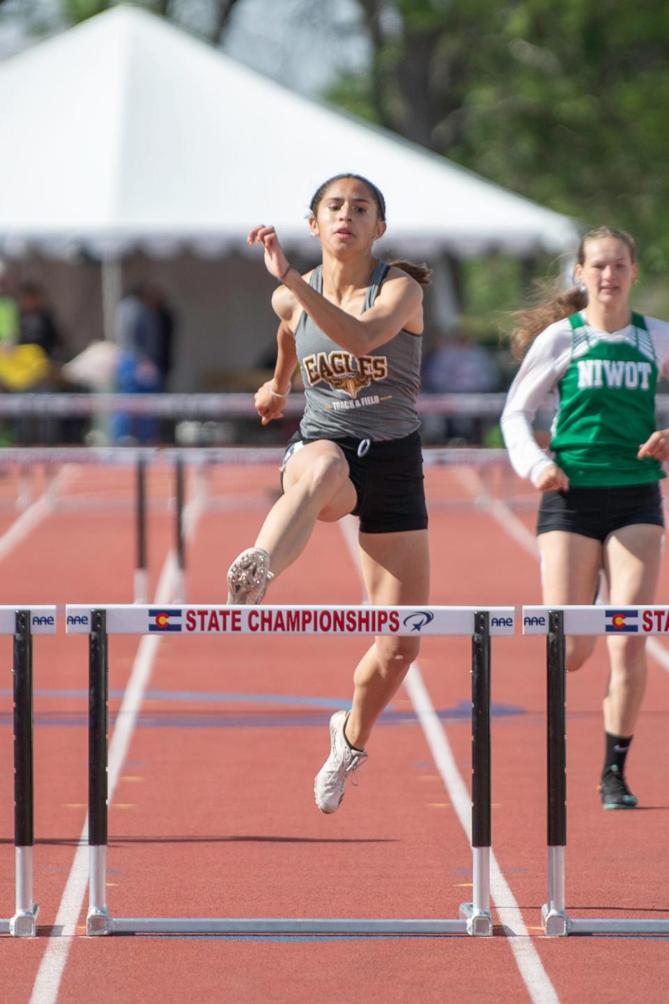 Pueblo East's Leyah Martinez clears the final hurdle in the Class 4A 300 meter hurdle qualifying race during the CHSSA state track and field meet on Saturday, May 21, 2022 at Jeffco Stadium.