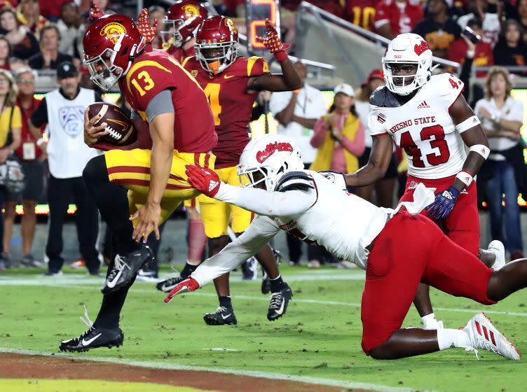 LOS ANGELES, CALIF. - SEP. 17, 2022. USC quarterback Caleb Williams scores a touchdown.