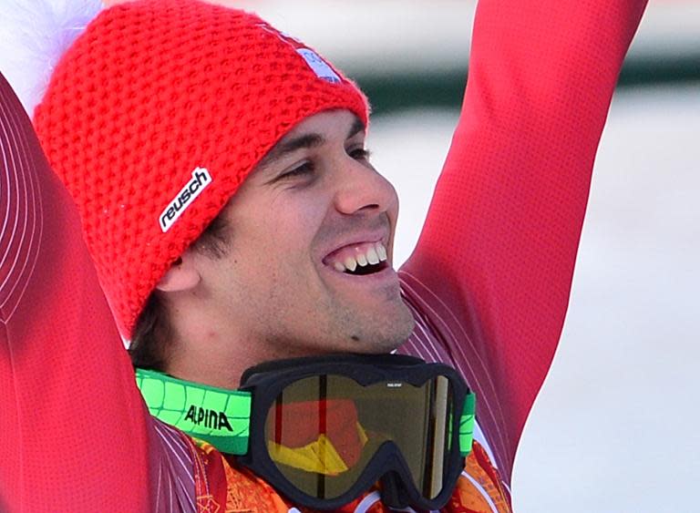 Switzerland's Sandro Viletta reacts after winning the Alpine skiing super sombined slalom during the Sochi Winter Olympics on February 14, 2014