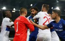 Soccer Football - Europa League - Everton vs Olympique Lyonnais - Goodison Park, Liverpool, Britain - October 19, 2017 Everton's Ashley Williams clashes with Lyon's Anthony Lopes as teammates intervene REUTERS/Andrew Yates