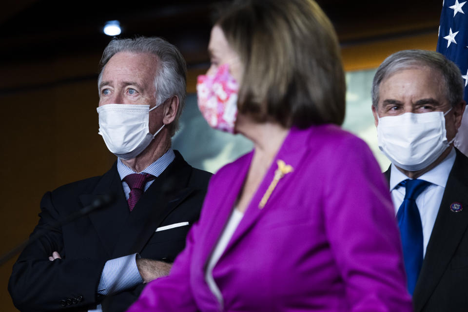 UNITED STATES - MARCH 09: Rep. Richard Neal, D-Mass., left, chairman of the Way and Means Committee, Rep. John Yarmuth, D-Ky., chairman of the House Budget Committee, and Speaker of the House Nancy Pelosi, D-Calif., conduct a news conference on the coronavirus relief bill, the American Rescue Plan Act, in the Capitol Visitor Center on Tuesday, March 9, 2021. (Photo By Tom Williams/CQ-Roll Call, Inc via Getty Images)