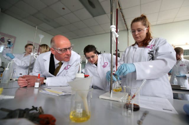 Education Secretary John Swinney, left, has extended the scheme (Andrew Milligan/PA)