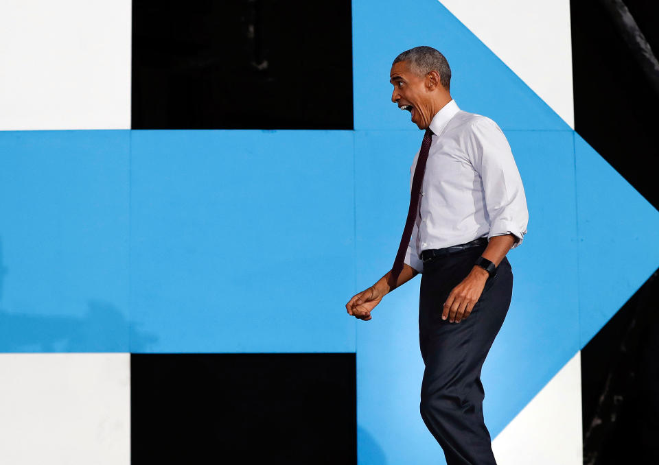 <p>President Barack Obama reacts to seeing supporters as he walks on stage at PNC Music Pavilion in Charlotte, N.C., Friday, Nov. 4, 2016 during a campaign rally for Democratic presidential candidate Hillary Clinton. (AP Photo/Pablo Martinez Monsivais) </p>