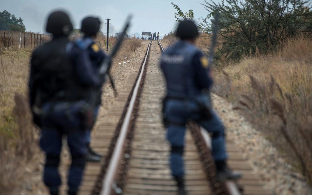 South African riot police - AFP