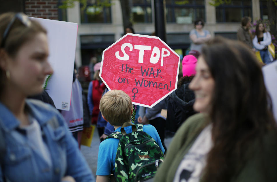 A 9-year-old carries a sign at a May abortion rights rally in Portland, Maine. (Photo: Derek Davis/Portland Press Herald via Getty Images)