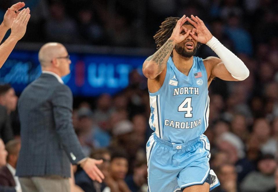 North Carolina’s R.J. Davis (4) reacts after sinking a three-point basket against Connecticut during the first half in the Jimmy V Classic on Tuesday, December 5, 2023 at Madison Square Garden in New York, NY.