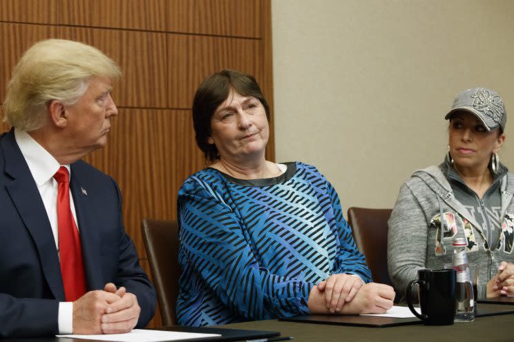 Donald Trump, left, and Paula Jones, right, look on as Kathy Shelton makes remarks in St. Louis. (Photo: Evan Vucci/AP)