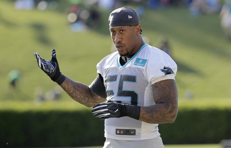FILE - In this July 25, 2019, file photo, Carolina Panthers' Bruce Irvin (55) stretches during practice at the NFL football team's training camp in Spartanburg, S.C. Irvin jumped at the chance to return to Seattle this offseason, but his reunion with the Seahawks comes with the expectation he can help a lackluster pass rush. (AP Photo/Chuck Burton, File)