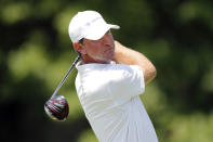 Lucas Glover hits from the 18th tee during the first round of the Rocket Mortgage Classic golf tournament, Thursday, July 2, 2020, at the Detroit Golf Club in Detroit. (AP Photo/Carlos Osorio)