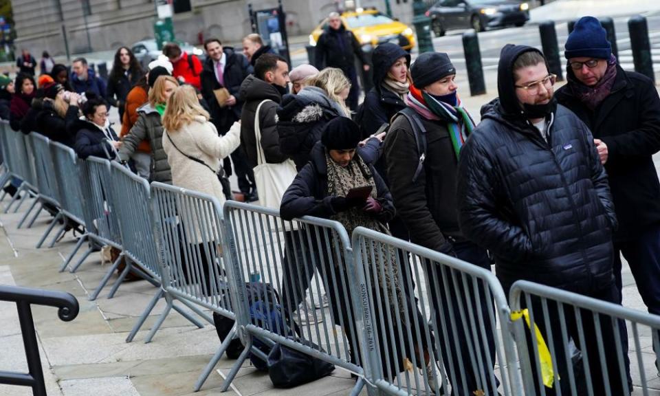 People line up to enter the court for the Ghislaine Maxwell trial on Tuesday.