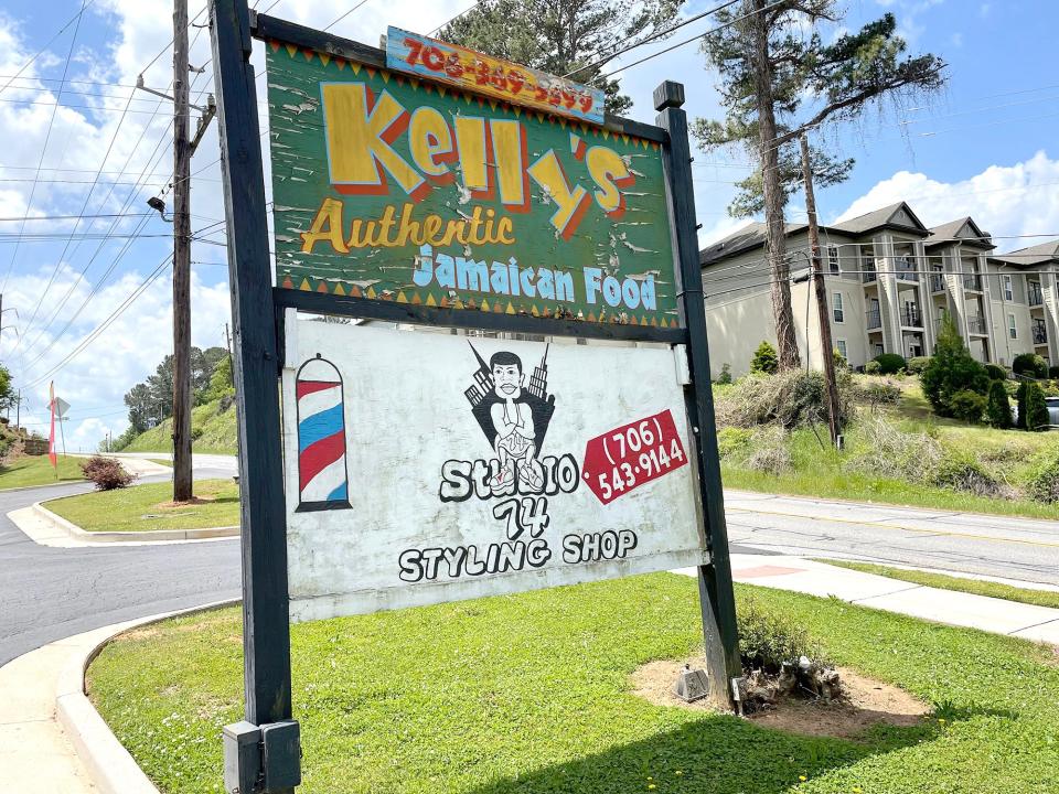 This photo taken April 25, 2022, at 145 Epps Bridge Road in Athens, Ga., shows the sign for Kelly's Authentic Jamaican Food. Owner Kelly Codling is closing the location on May 1 after 10 years in business, but will continue to operate the Five Points restaurant.