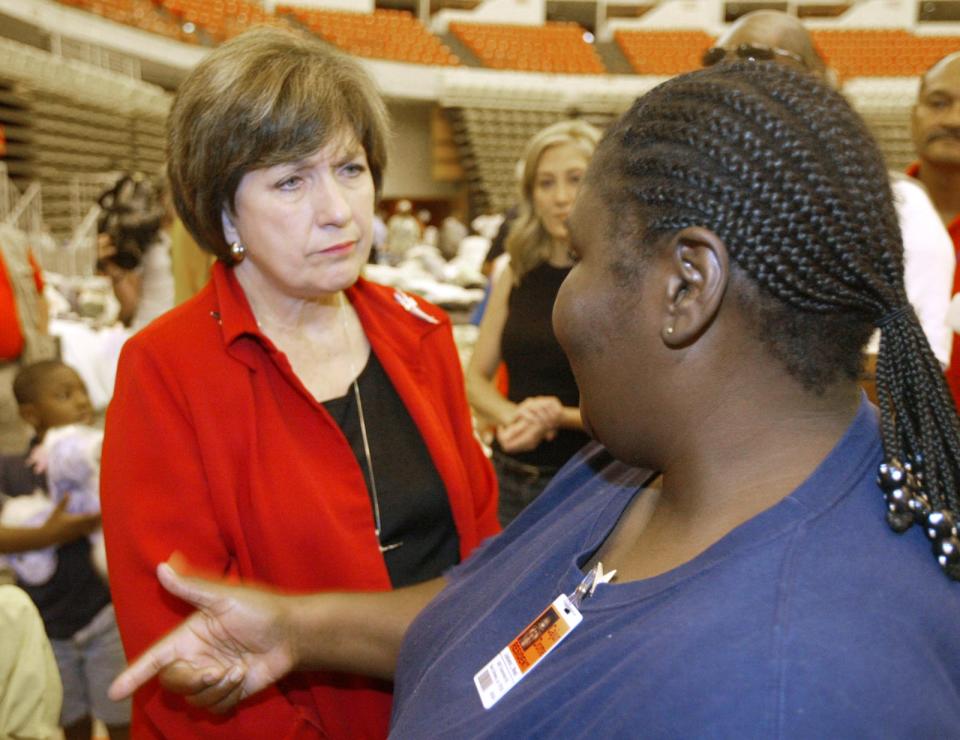 Gov. Kathleen Blanco talks with Hurricane Katrina evacuee and now Cajundome resident Joeliene West at the Cajundome Sept. 17, 2005.